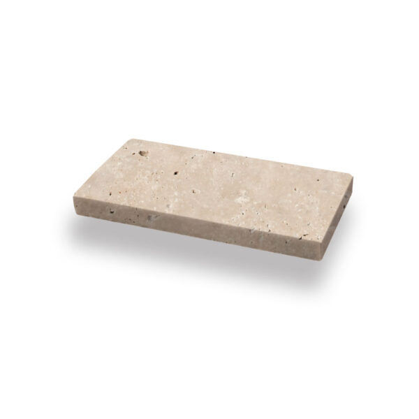 Ivory Premium Travertine 1-1/4x4x8 Tumbled Paver